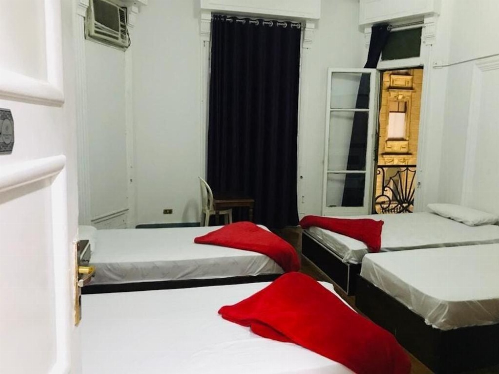 Basic Triple Room with Shared Bathroom